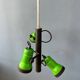 Vintage pendant light with three green spots.