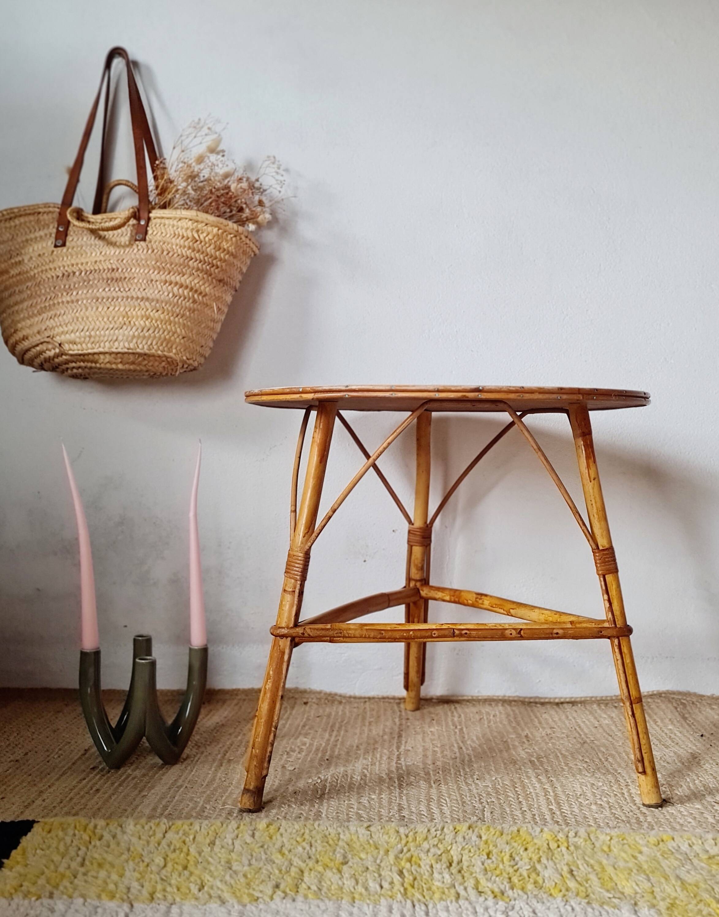 Round soft pink rattan table