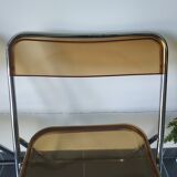 Seventies stainless steel and caramel chairs