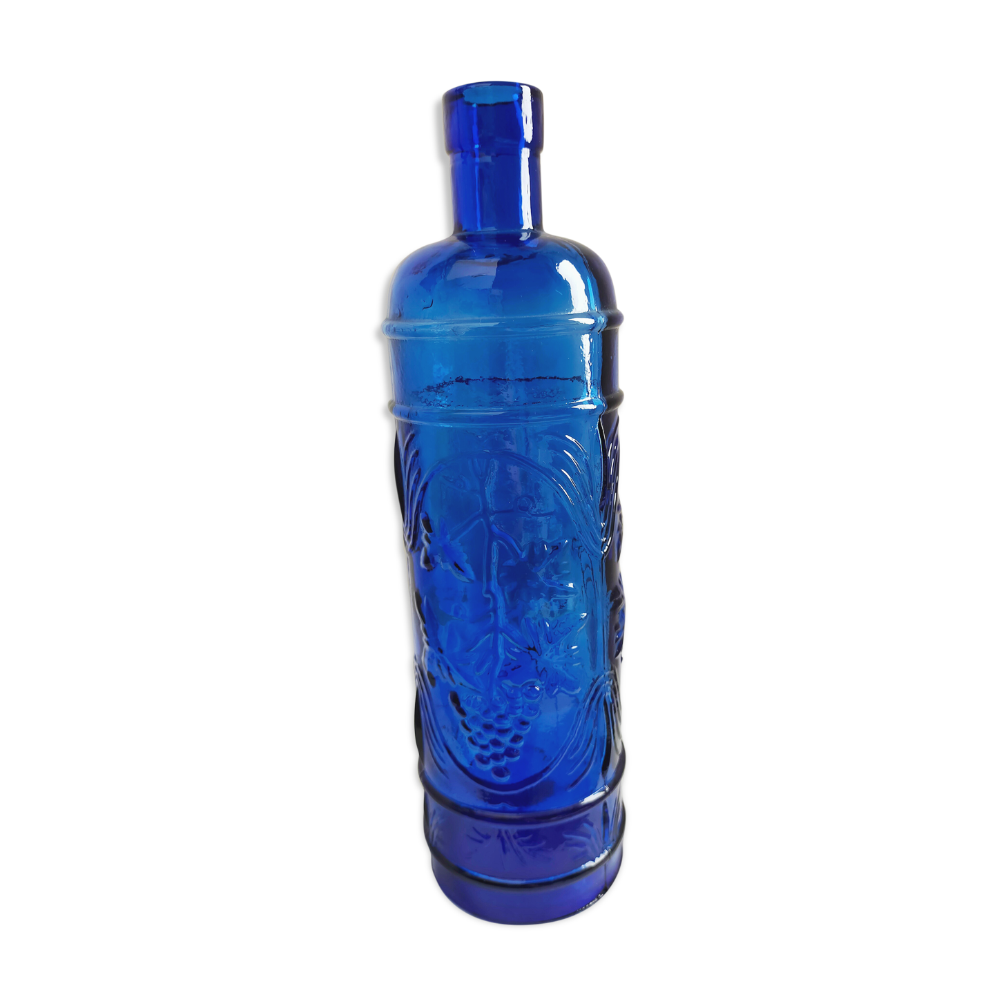 cobalt blue molded glass bottle in relief decoration bunches of grapes