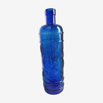 cobalt blue molded glass bottle in relief decoration bunches of grapes