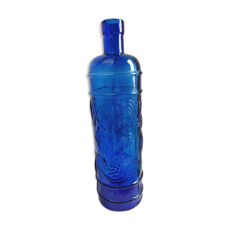 cobalt blue molded glass bottle in relief decoration bunches of grapes