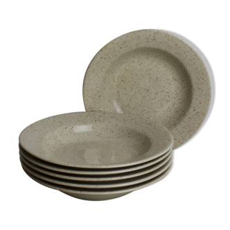 Hollow plates in beige speckled sandstone