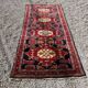 Long antique Persian carpet