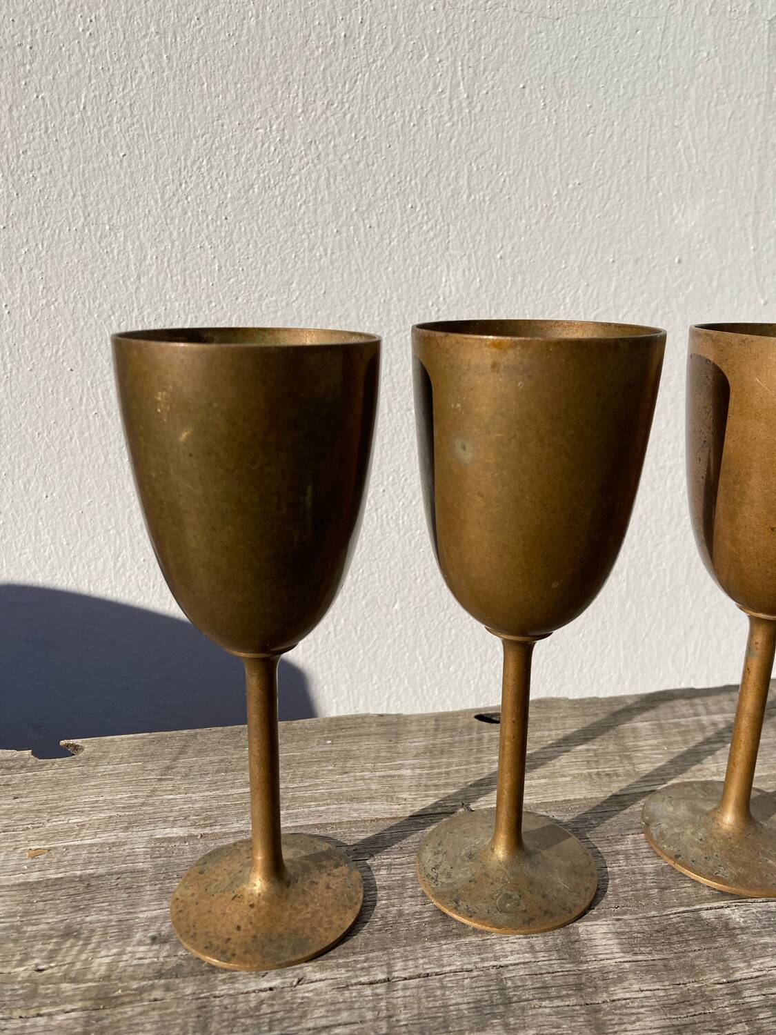 Copper brass stemmed glasses