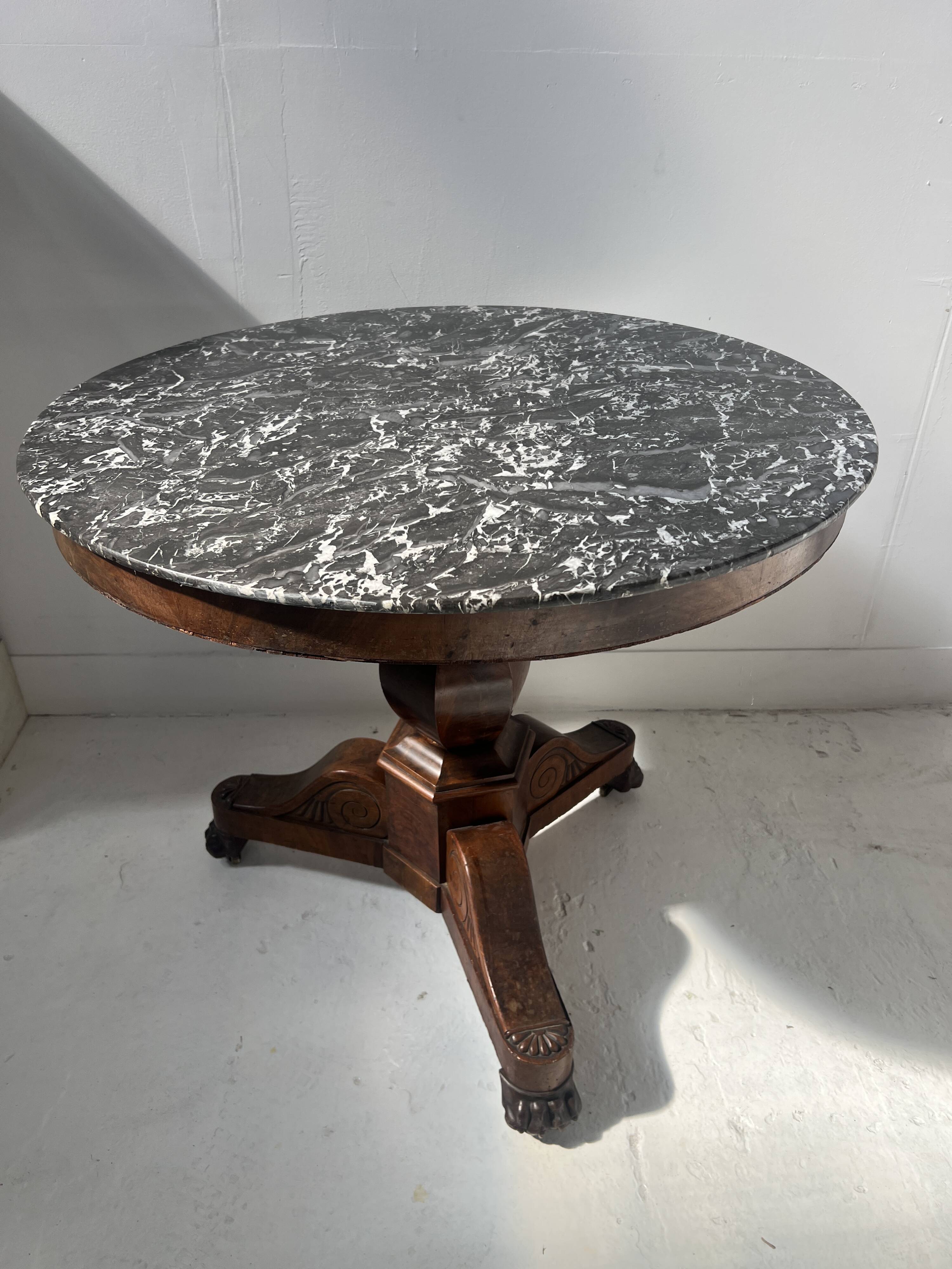 Empire-style mahogany and veneer guéridon, 19th century.