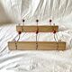 Pair of vintage wooden wall coat racks with three red ball hooks
