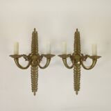 Pair of two-armed Empire wall sconces in gilded bronze