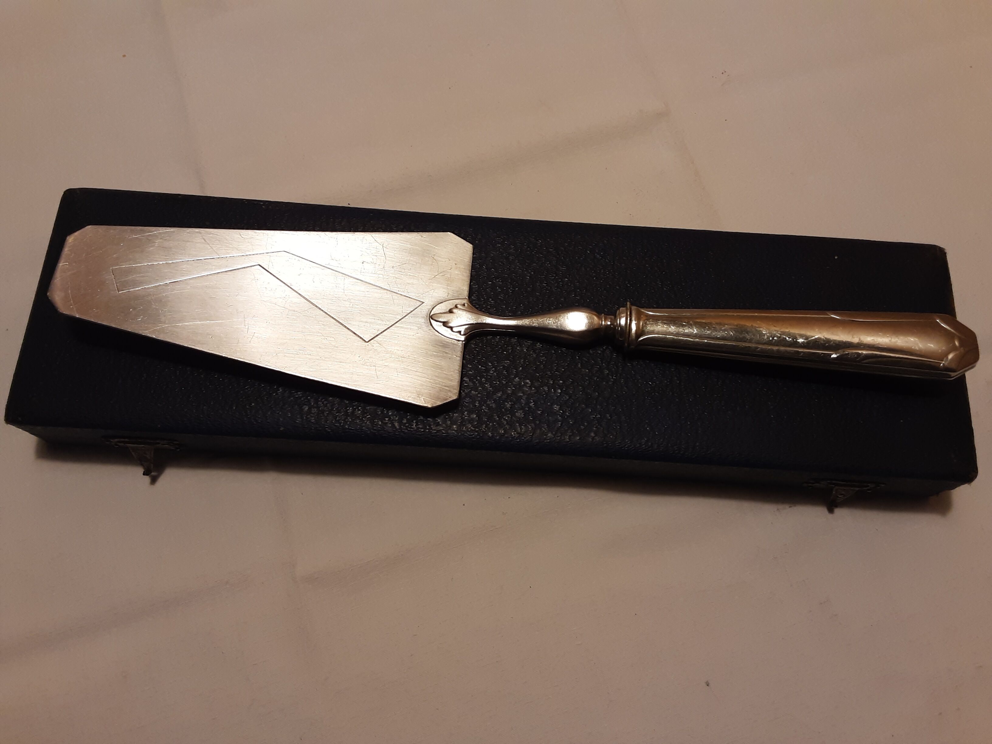 Silver metal pie shovel