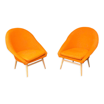 1960s orange shell armchairs