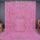 Tapis Oushak rose vintage
