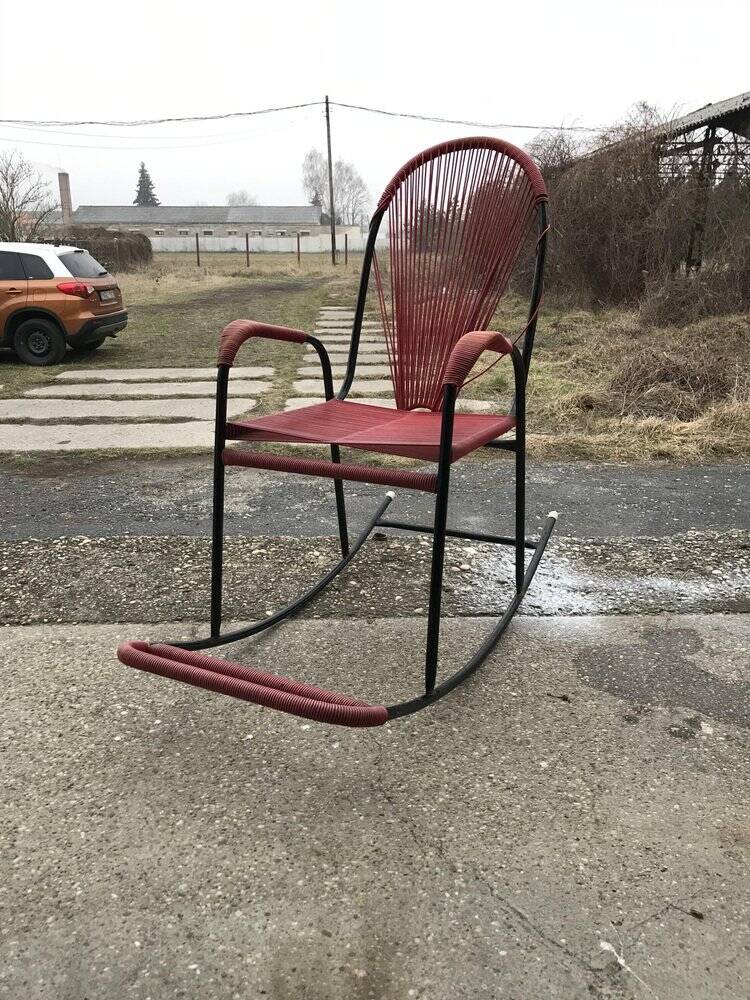 Vintage red metal rocking chair, graphic plastic cord with fan backrest, 1960s.