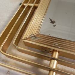 Vintage faceted mirror in an aluminium frame