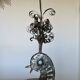 metal sculpture in sheet metal representing a peacock, work from the 1960s