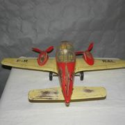 Old metal Joustra toy; propeller aircraft with its pilot friction mechanism