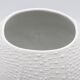Biscuit porcelain vase by Kaiser, relief decoration, op art design.