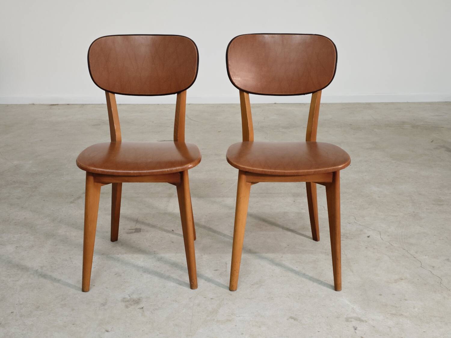 Pair of vintage French chairs in light brown skai