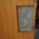 Bar cabinet opening with 2 doors from the 1950s.