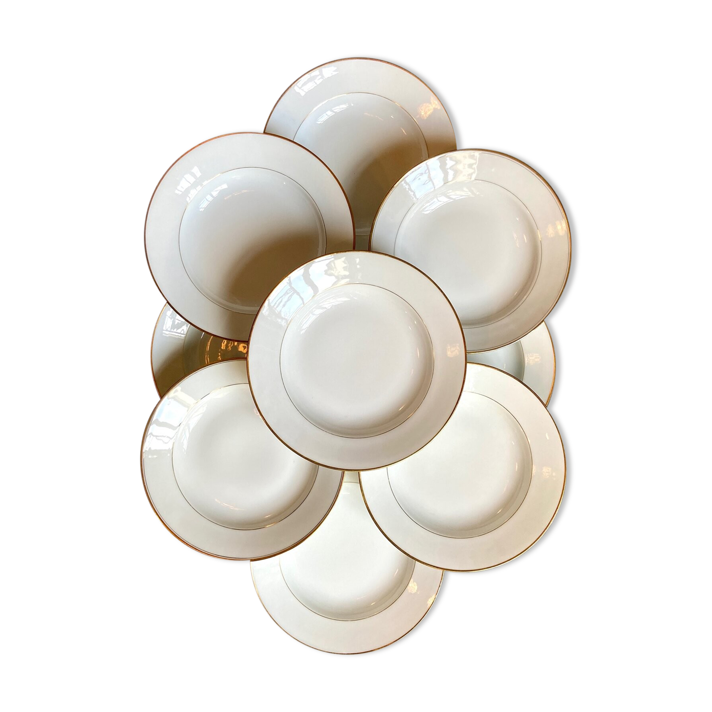 9 hollow plates in white and golden Limoges porcelain