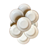 9 hollow plates in white and golden Limoges porcelain