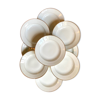 9 hollow plates in white and golden Limoges porcelain