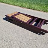 Set of 2 folding chairs in wood and cane.