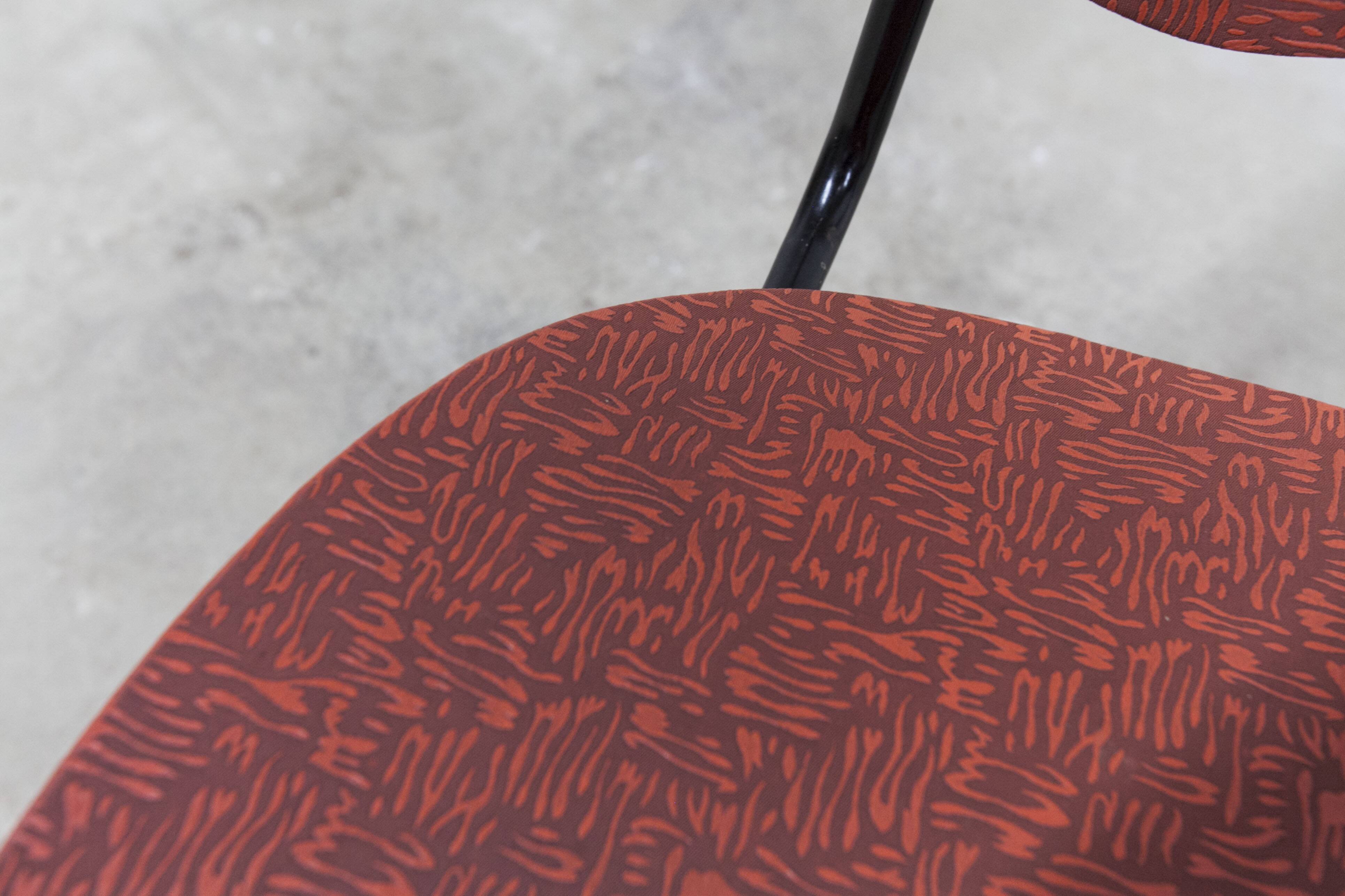 Vintage 70s chair in black lacquered metal and atypical red vinyl