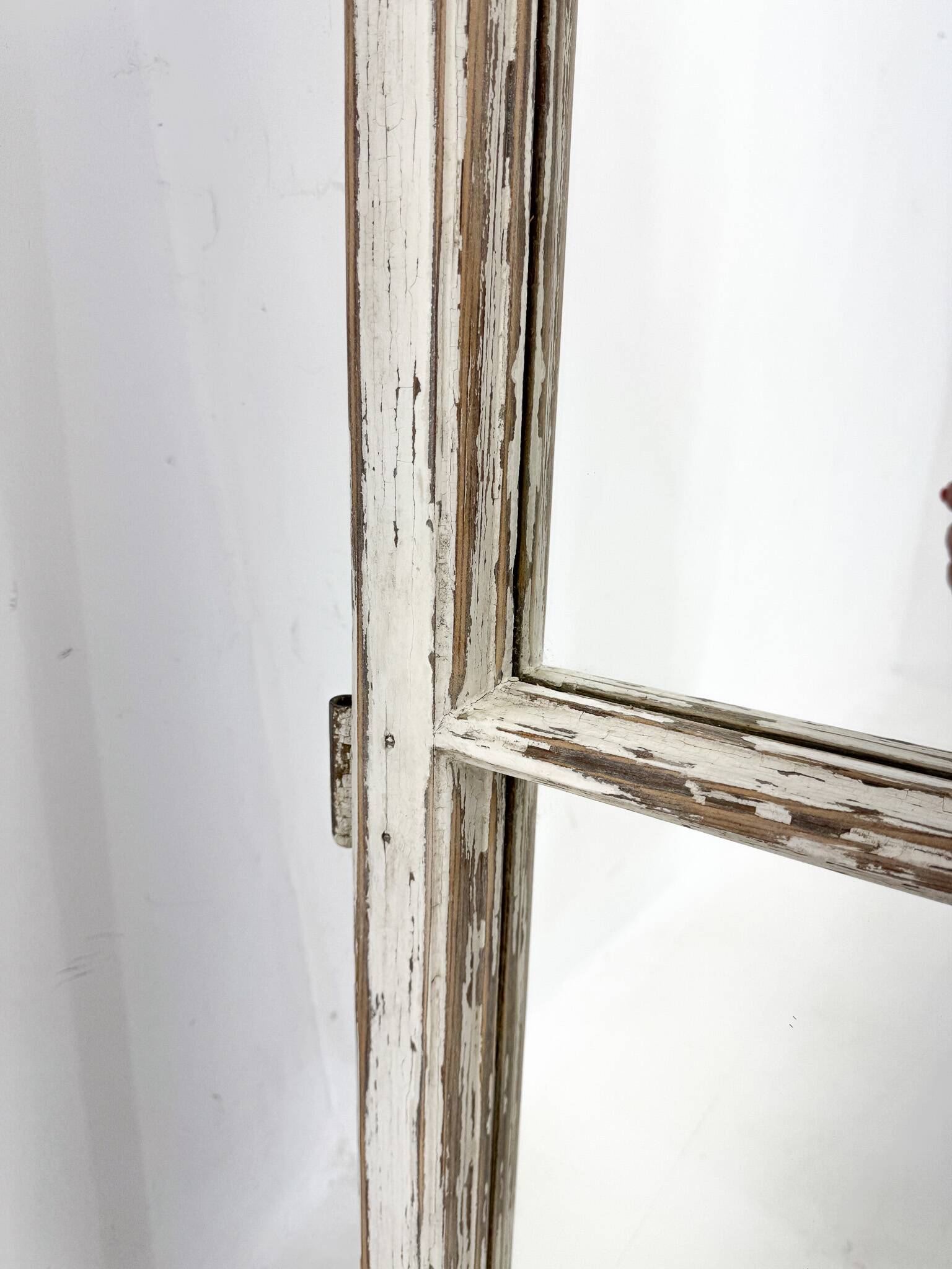 Vintage wooden window converted to a mirror