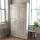 Antique wardrobe in patinated pine