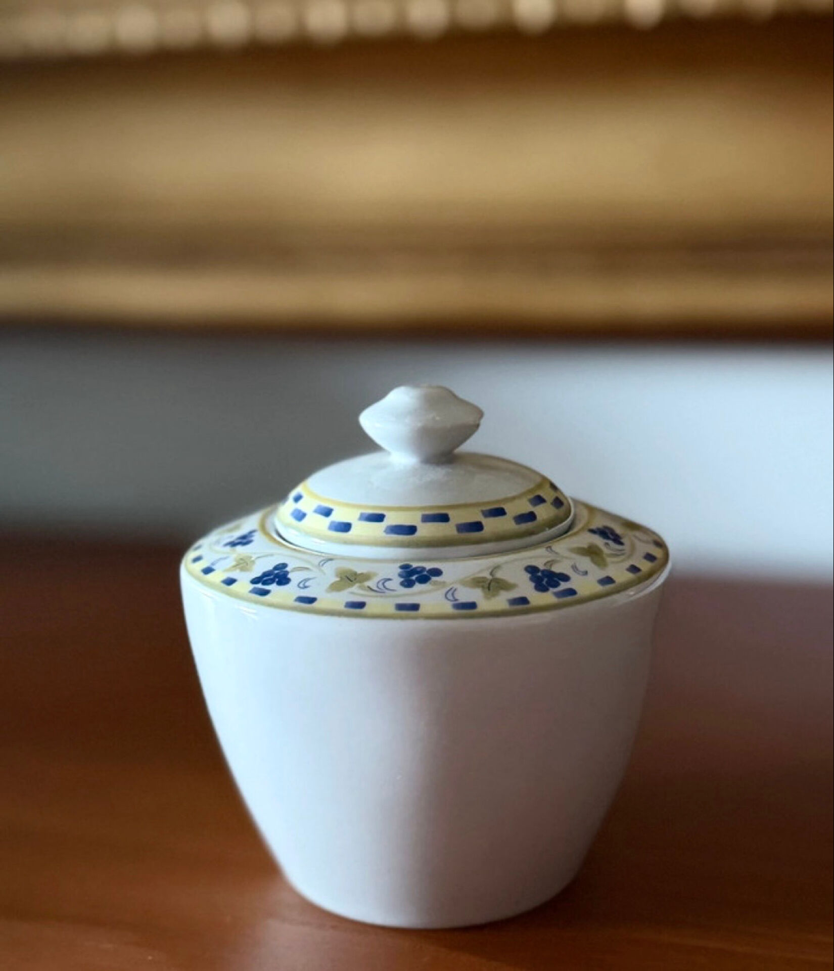 Fine porcelain sugar bowl from Bavaria with a grape design.