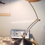 Articulated black and gold metal desk lamp