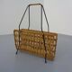 Magazine rack in filigree rattan and steel, 1960s
