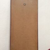 Framed mirror in bronze