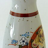 Far Eastern porcelain sake service consisting of a carafon and six cups