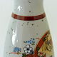 Far Eastern porcelain sake service consisting of a carafon and six cups