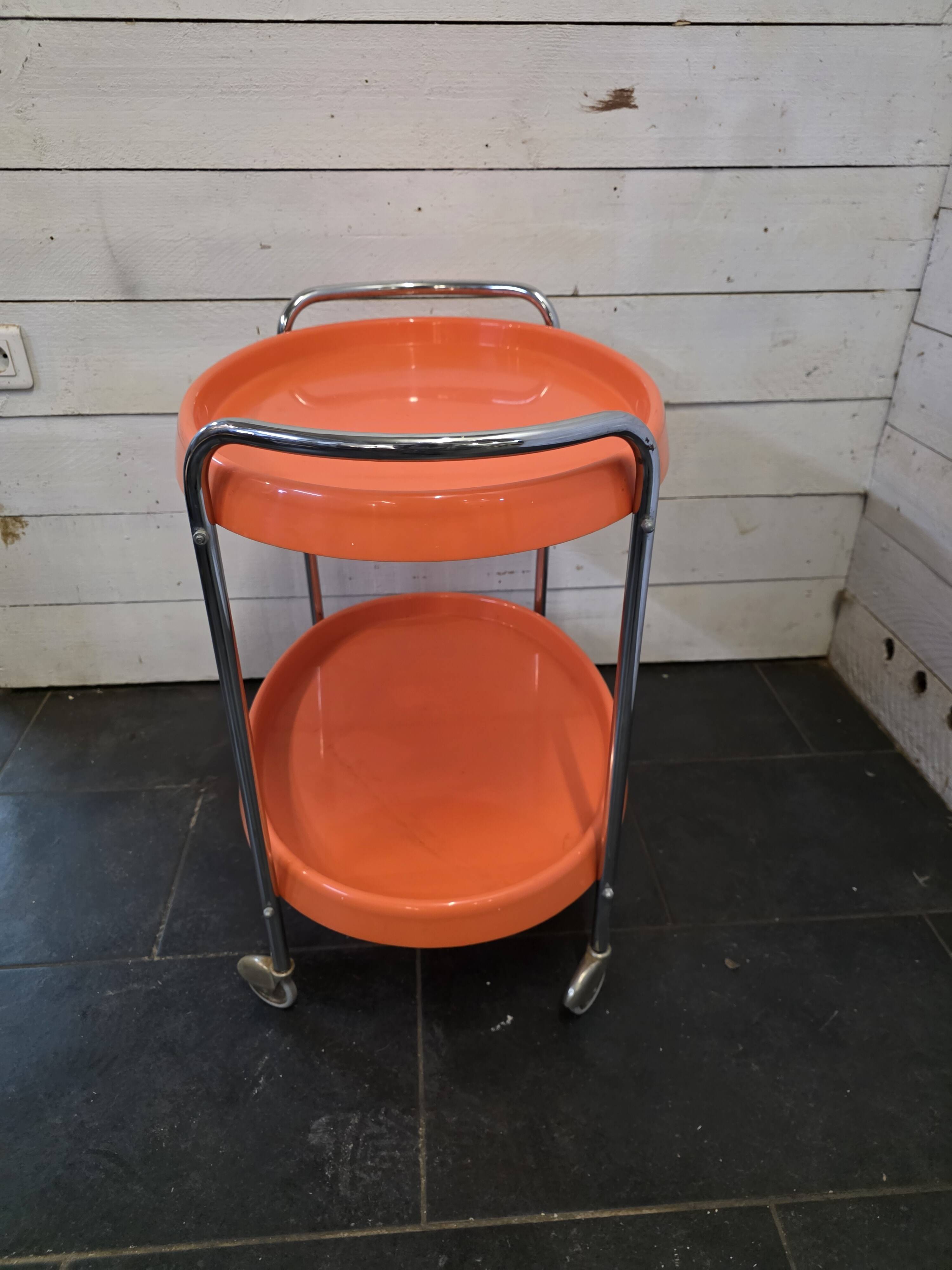 Orange rolling trolley from the 70s