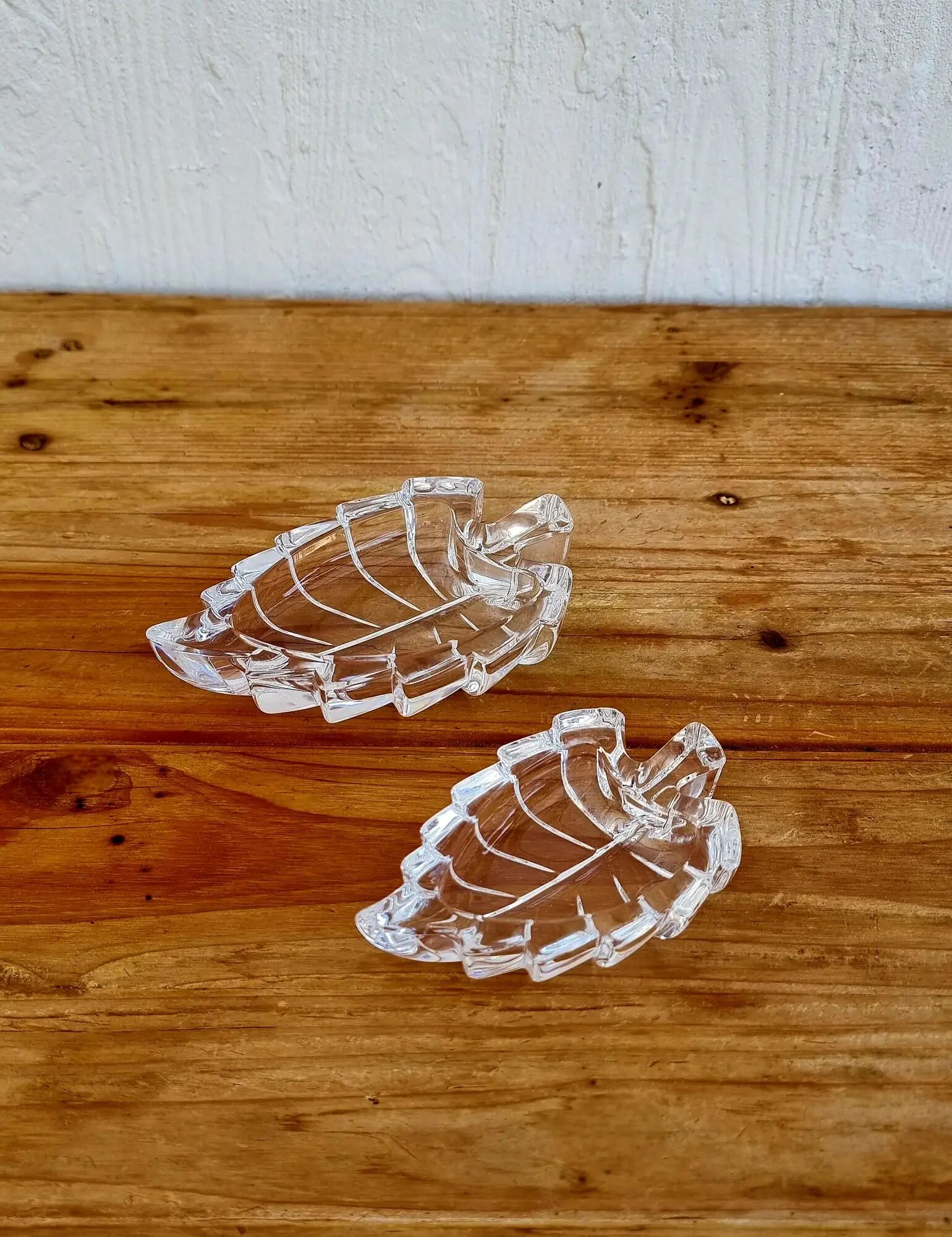 Pair of vintage leaf-shaped glass bowls from the 1970s.