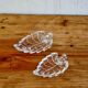 Pair of vintage leaf-shaped glass bowls from the 1970s.