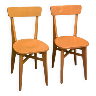 Pair of caramel bistro chairs 1950