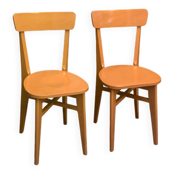Pair of caramel bistro chairs 1950