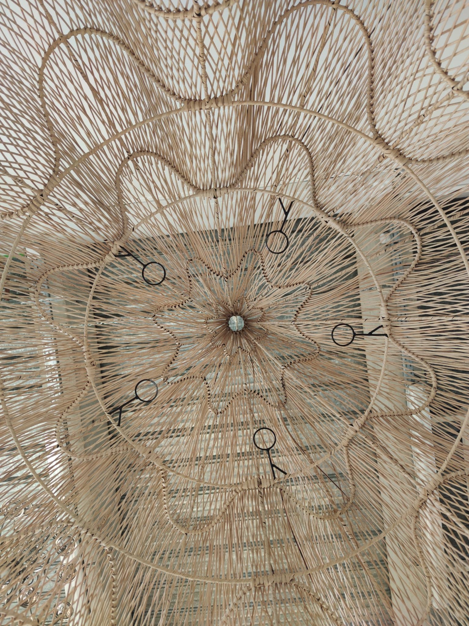 Huge rattan suspension in the shape of a corolla H:1m; D: 1m50