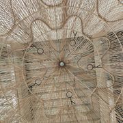 Huge rattan suspension in the shape of a corolla H:1m; D: 1m50