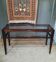 Contemporary console in varnished wood