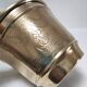 Three pot covers brass silver cover golden patina monogram early twentieth century