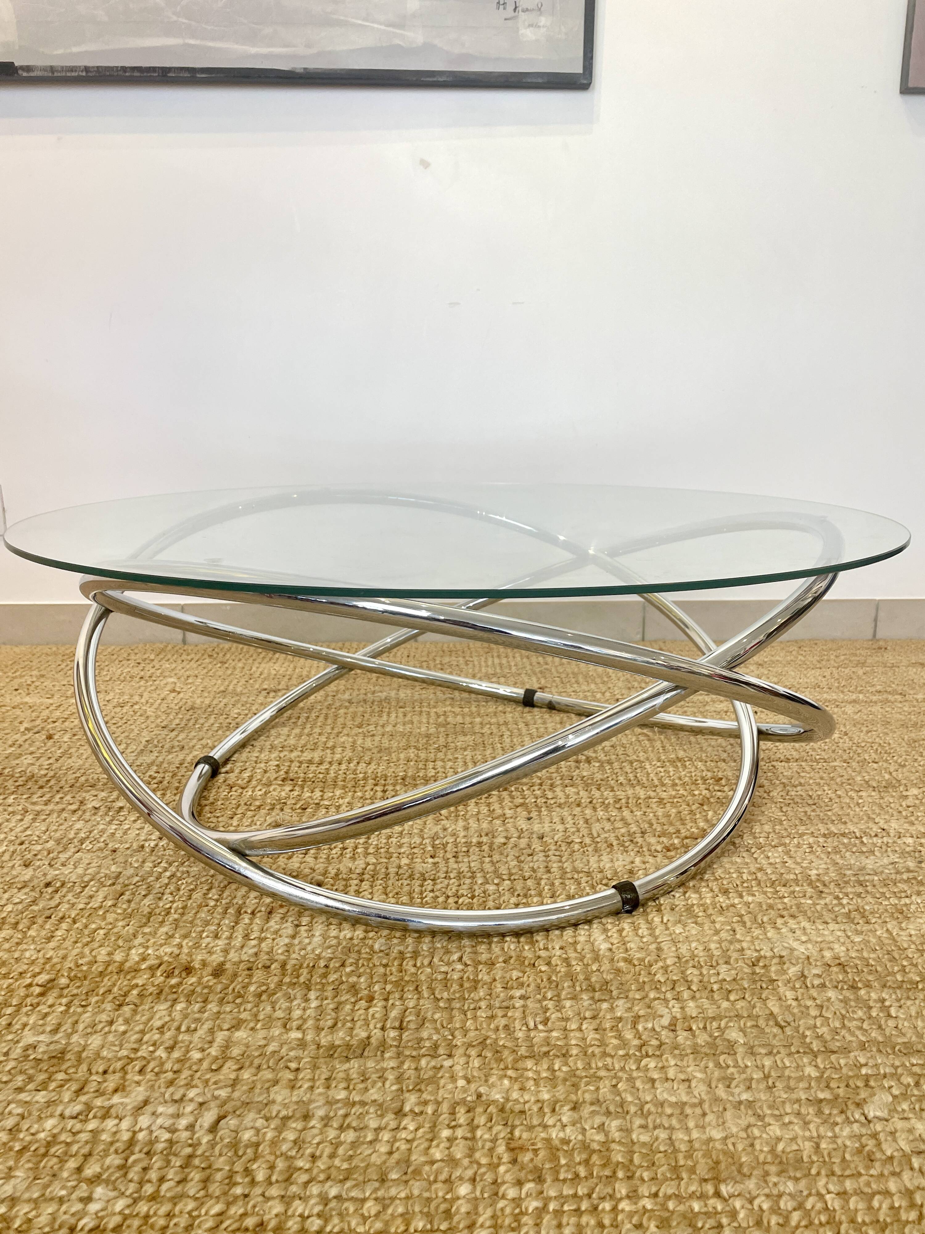 Coffee table with glass top and chrome tubular base