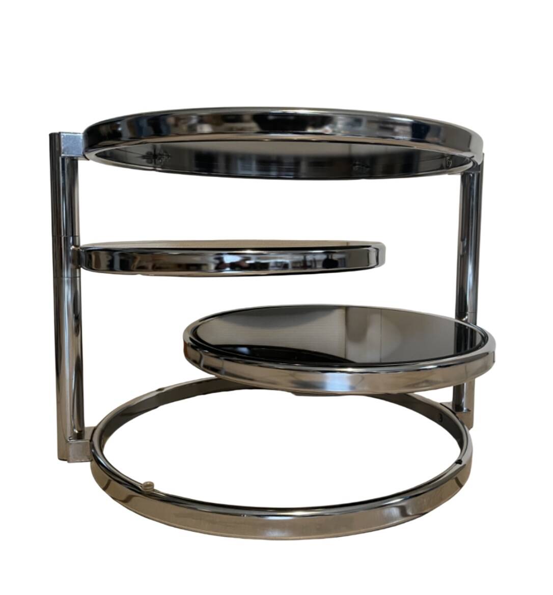 Coffee table with 3 chrome and smoked glass tops.