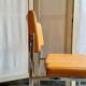 Chair in chromed metal and ochre skaï 1970s