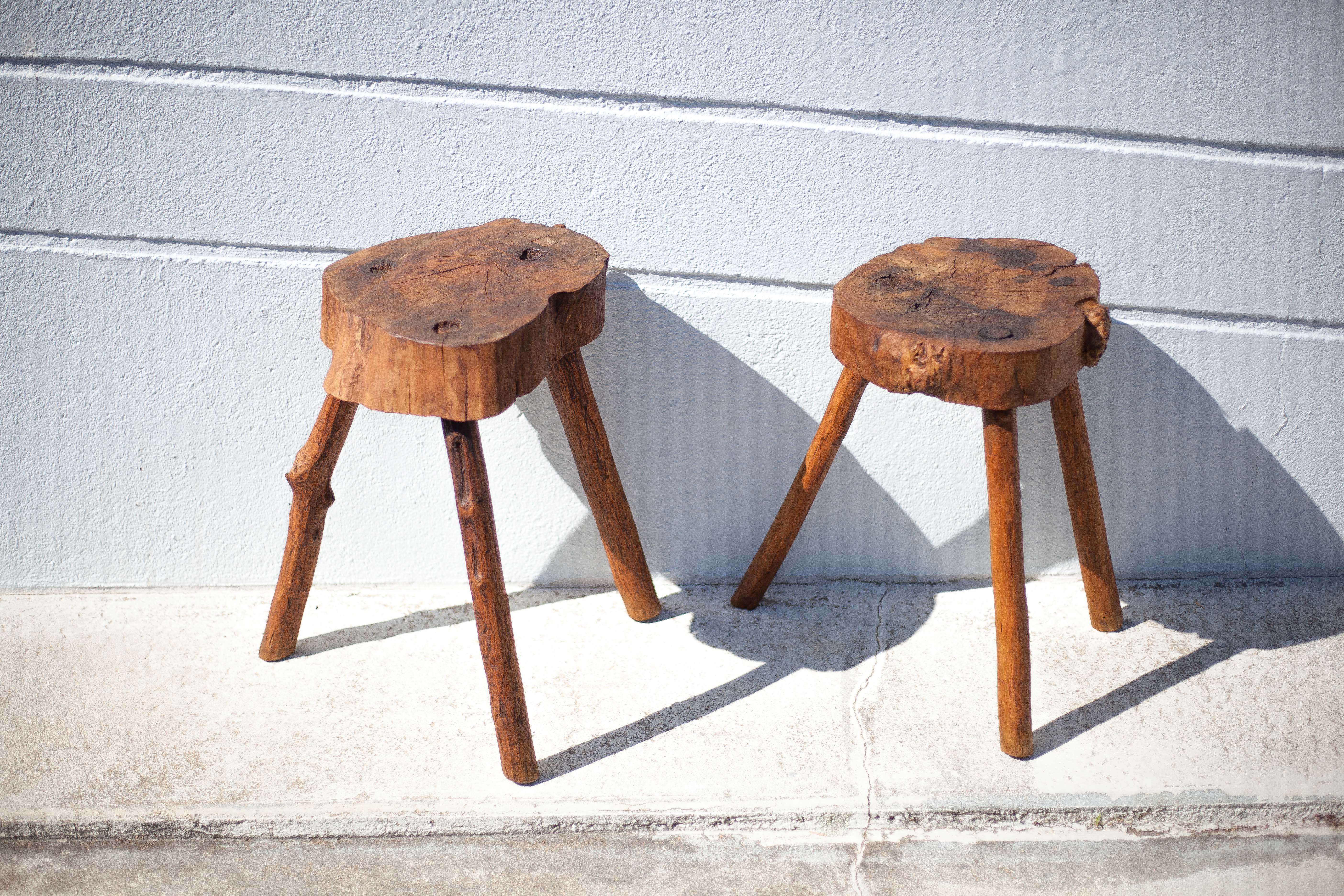 Pair of brutalist tripod wood stools