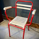 Four TOLIX chairs with armrests