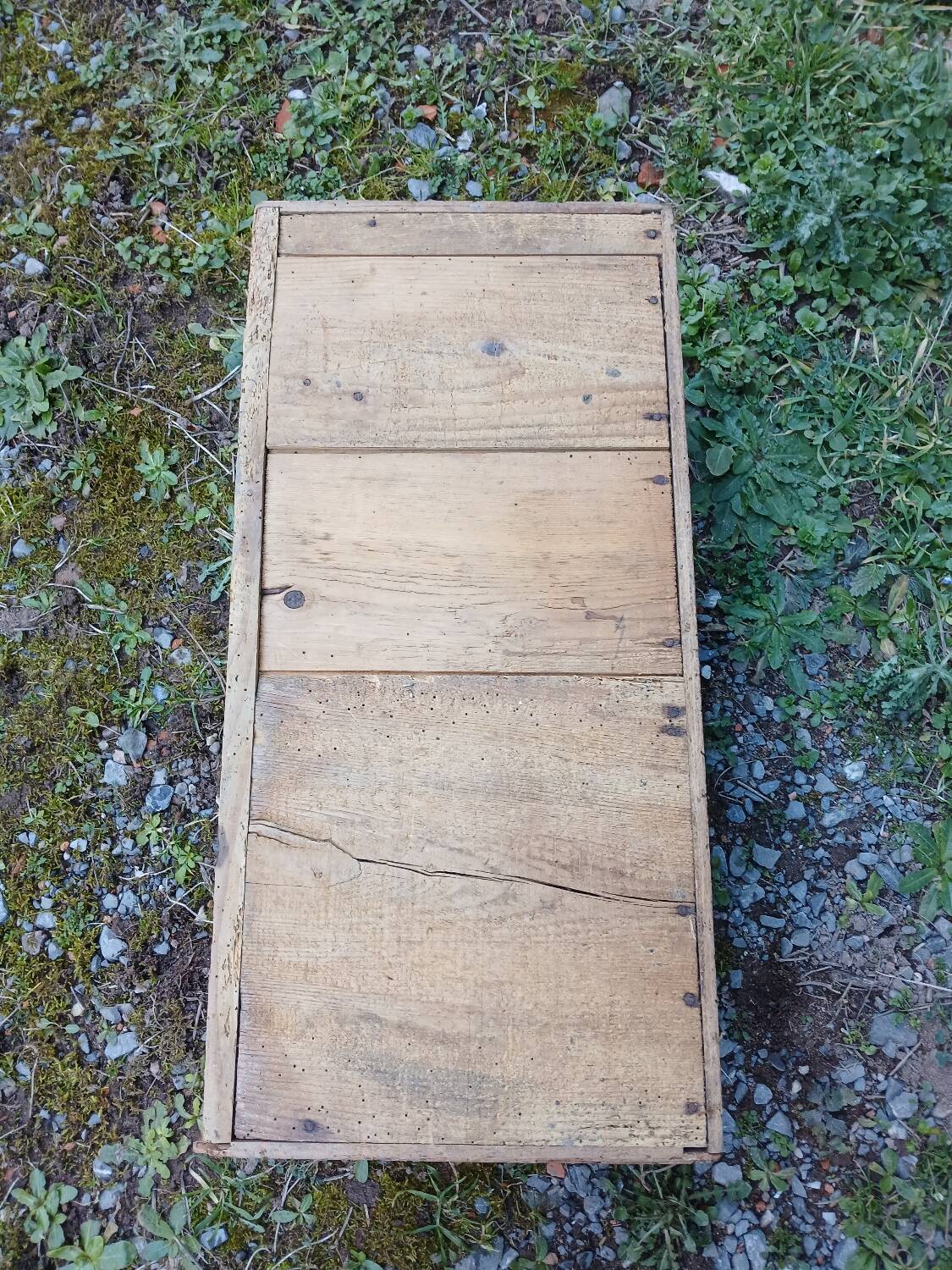 Small old wooden chest with hinged lid